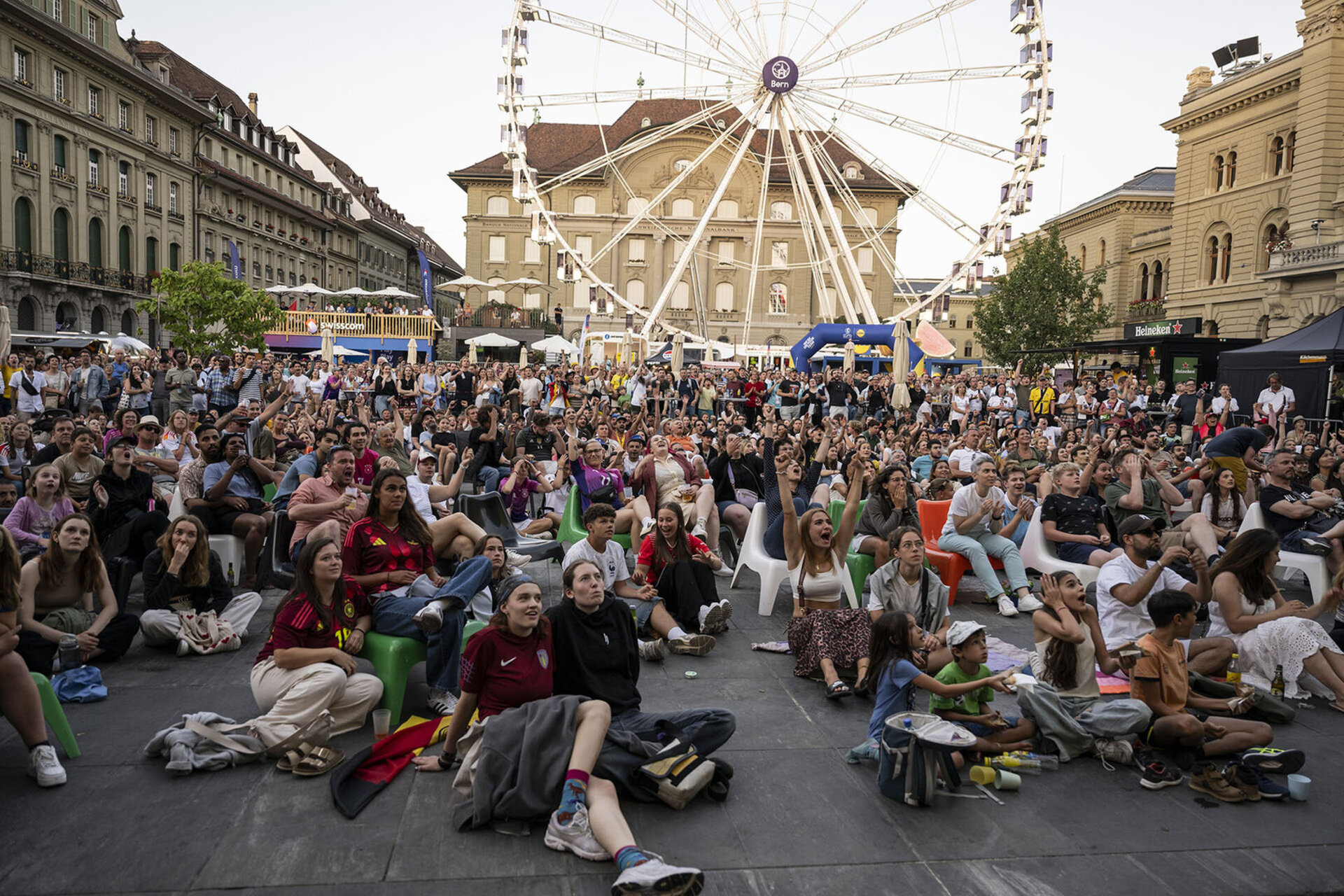 Spectators watch the Group C match of the UEFA Women's Euro 2025 soccer championships between Sweden and Germany, in the Fanzone on the Federal Square in Bern.