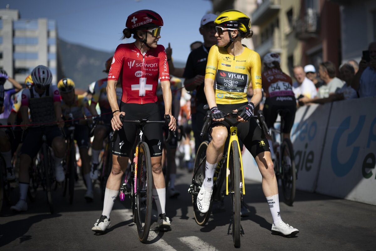 Steffi Haeberlin from Switzerland of Team SD Worx-Protime, left, and overall leader Femke de Vries from the Netherlands of Team Visma Lease a Bike, at the start during the second stage, a 105 km race with start and finish in Locarno, Switzerland, at the Tour de Suisse UCI WorldTour cycling women's race