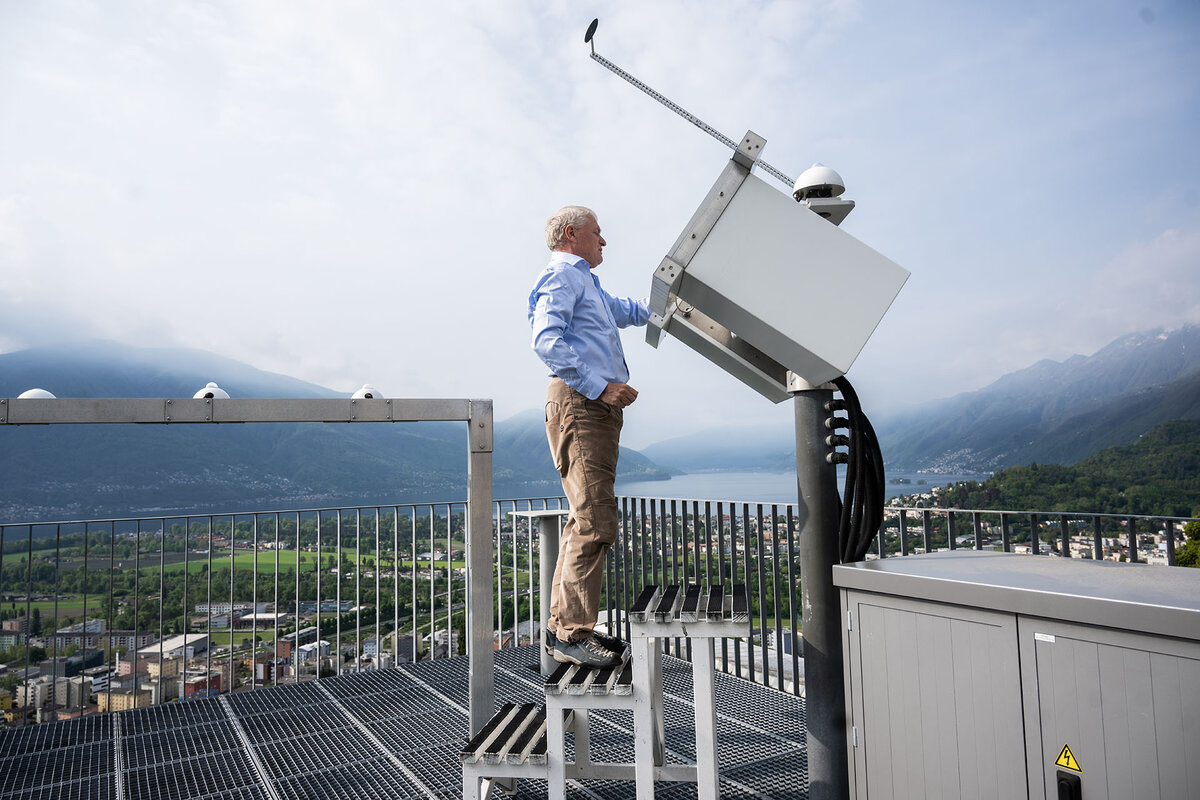 Meteorologist Nicola Gobbi carrying out maintenance on measuring instruments at the MeteoSvizzera Locarno Monti Observatory, Locarno.