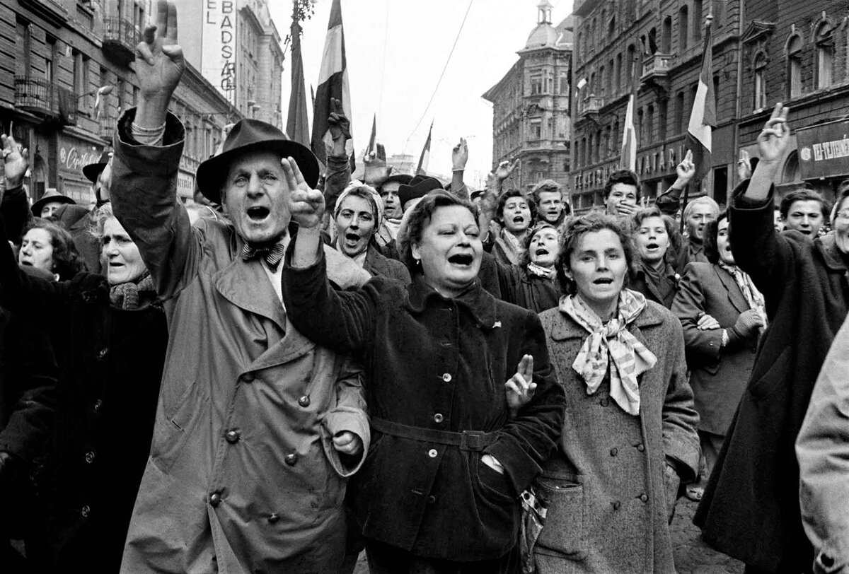 The Hungarian Revolution began with a first mass-rally in Budapest on October 23,1956. It was crushed by Soviet tanks and artillery after days of street-fighting. During the feigned Soviet retreat from Budapest on October 29 and 30, happy crowds marched through the city.