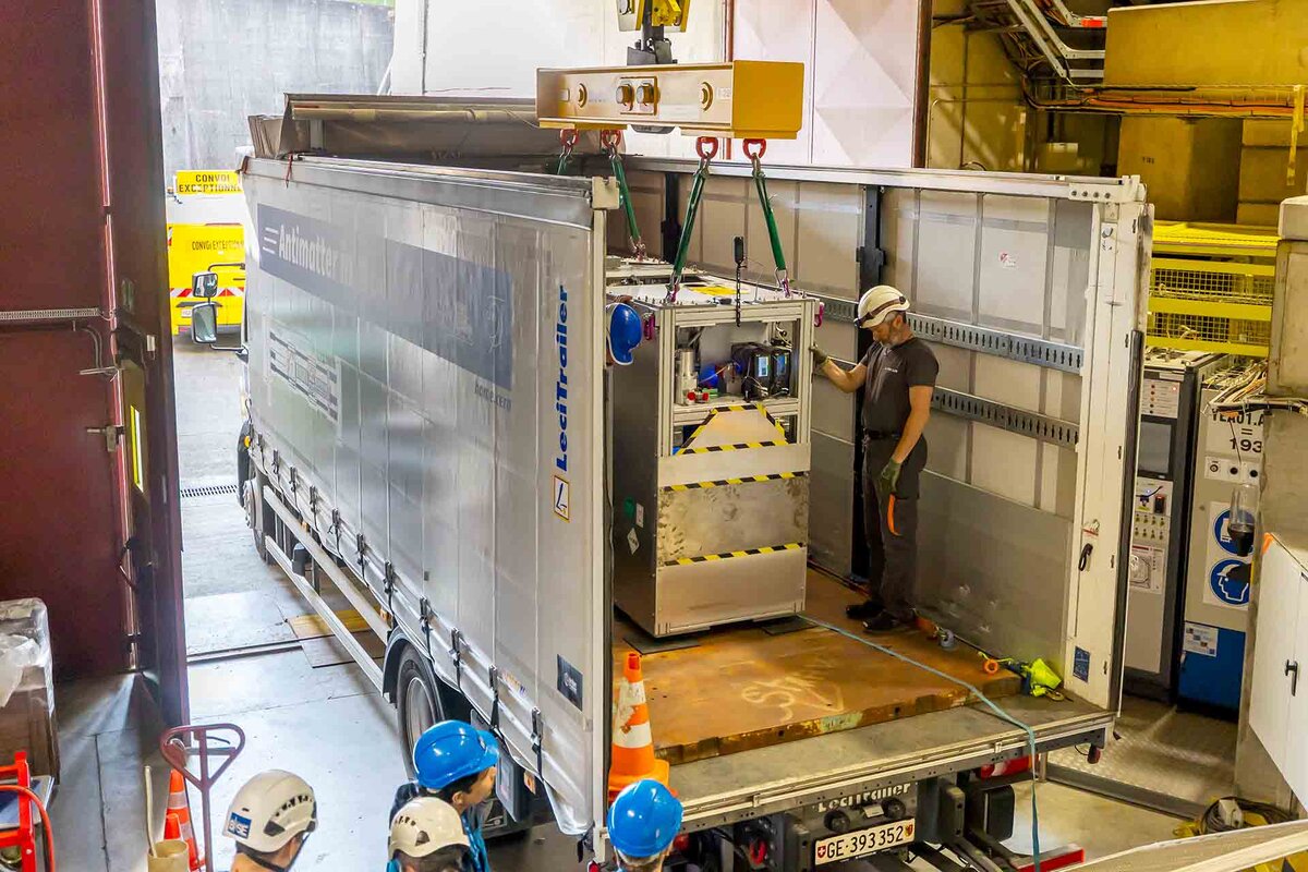 Technicians load the transportable antimatter trap (measuring just 2 metres in length, 1.58 metres in height and 0.87 metres across. Weighing in at 1 tonne) into a truck from the Antimatter Factory at the European Organization for Nuclear Research (CERN) for a road test, in Meyrin near Geneva, Switzerland, Tuesday, March 24, 2026. Scientists at CERN (the European Organization for Nuclear Research) transported antimatter by truck for the first time in a never-before-attempted test drive on the road.