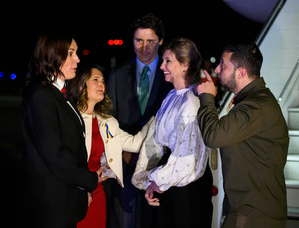 Ukrainian President Volodymyr Zelensky, right, and his wife Olena Zelenska, second from right, are greeted by Ambassador of Ukraine to Canada Yulia Kovaliv, left, Deputy Prime Minister Chrystia Freeland, second from left, and Prime Minister Justin Trudeau