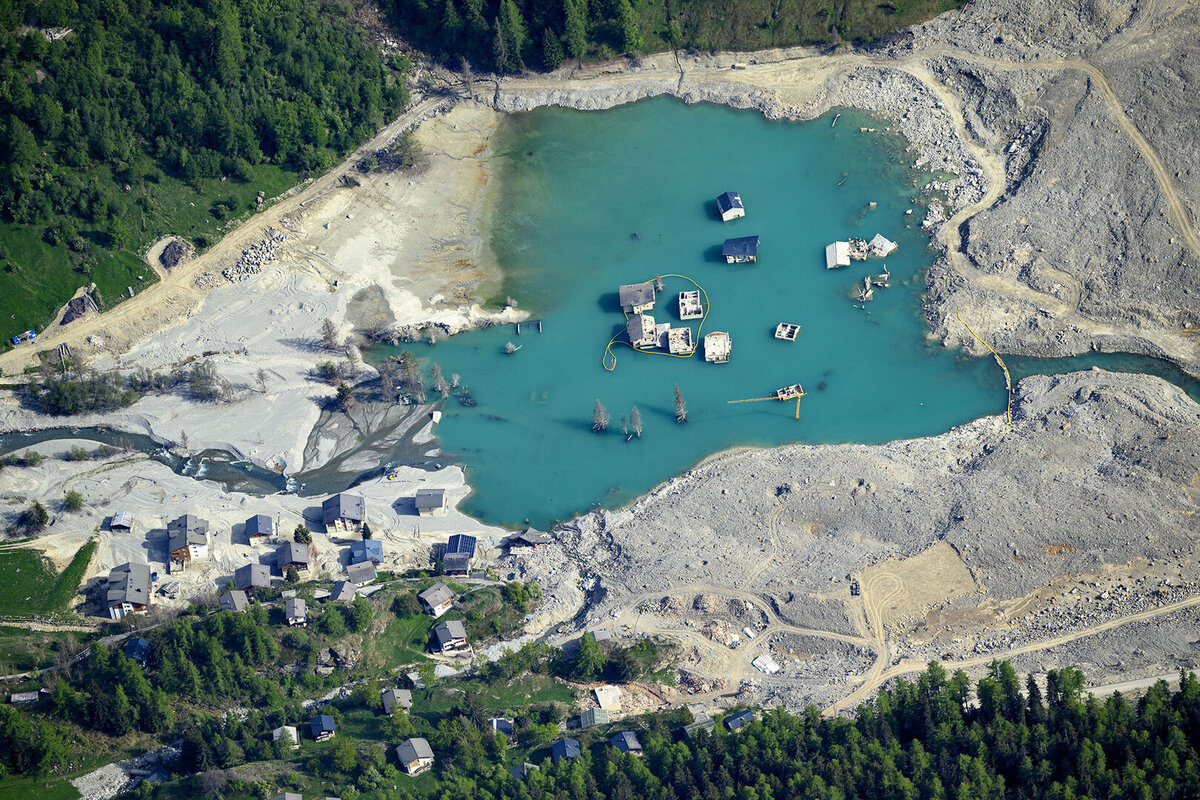 The massive landslide and debris field caused by the collapse of the Birch Glacier, which unleashed tons of rock and ice into the Loetschental valley pictured 1 year after the landslide destroyed the village, in Blatten, Switzerland.