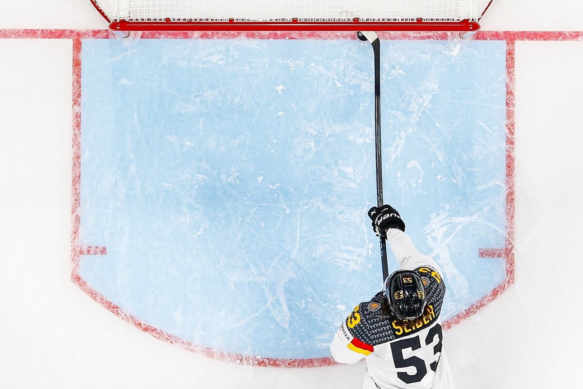 Germany's Moritz Seider saves a puck on the line during the 2026 IIHF Men's Ice Hockey World Championship preliminary round group A game between Finland and Germany