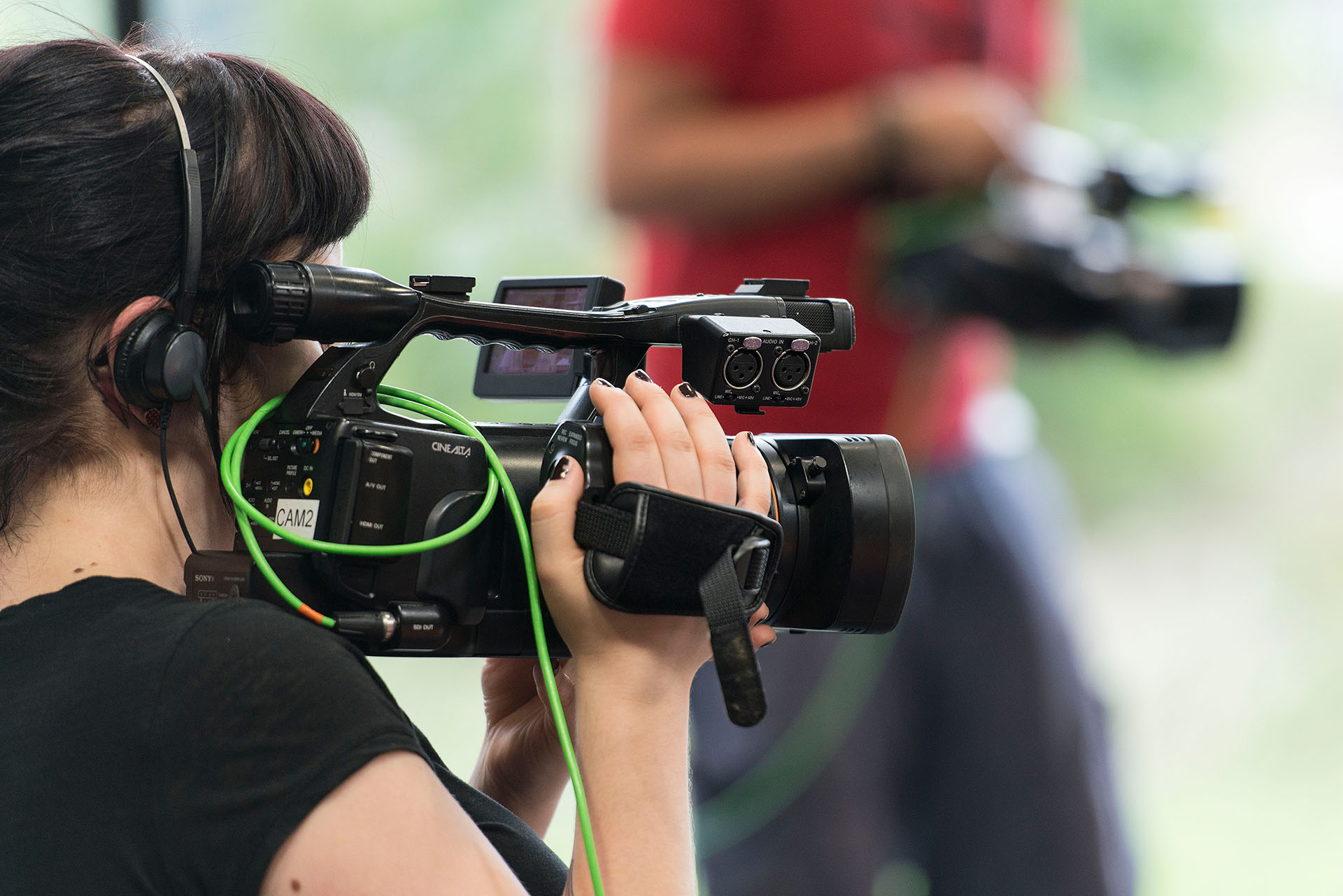 La camerawoman filme l'emission "Living Room", photographie chez Joiz.