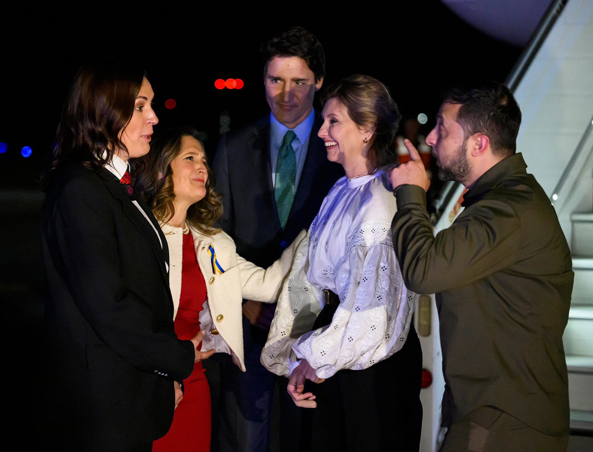 Ukrainian President Volodymyr Zelensky, right, and his wife Olena Zelenska, second from right, are greeted by Ambassador of Ukraine to Canada Yulia Kovaliv, left, Deputy Prime Minister Chrystia Freeland, second from left, and Prime Minister Justin Trudeau